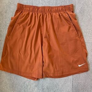 Nike burnt orange dri fit shorts Large